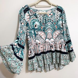 Peplum Bohemian Blouse with Vibrant Fun Print and Bell Sleeves by Crown and Ivy